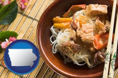 iowa map icon and a Thai curry dish at a Thai restaurant